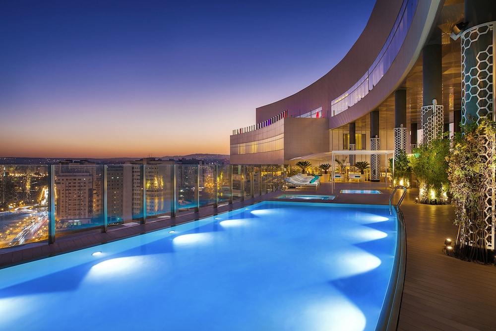 Hilton Tanger City Center Bagian luar foto The pool at the 360° Sky Lounge