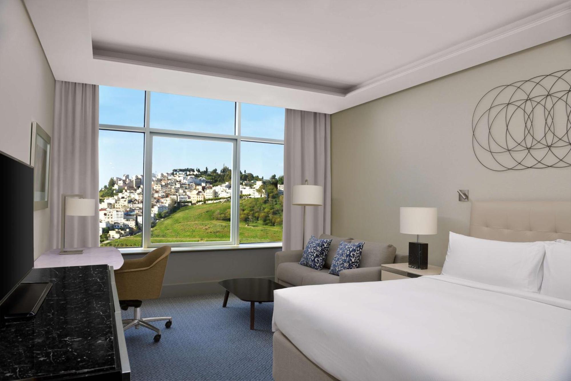 Hilton Tanger City Center Bagian luar foto A guest room at the hotel