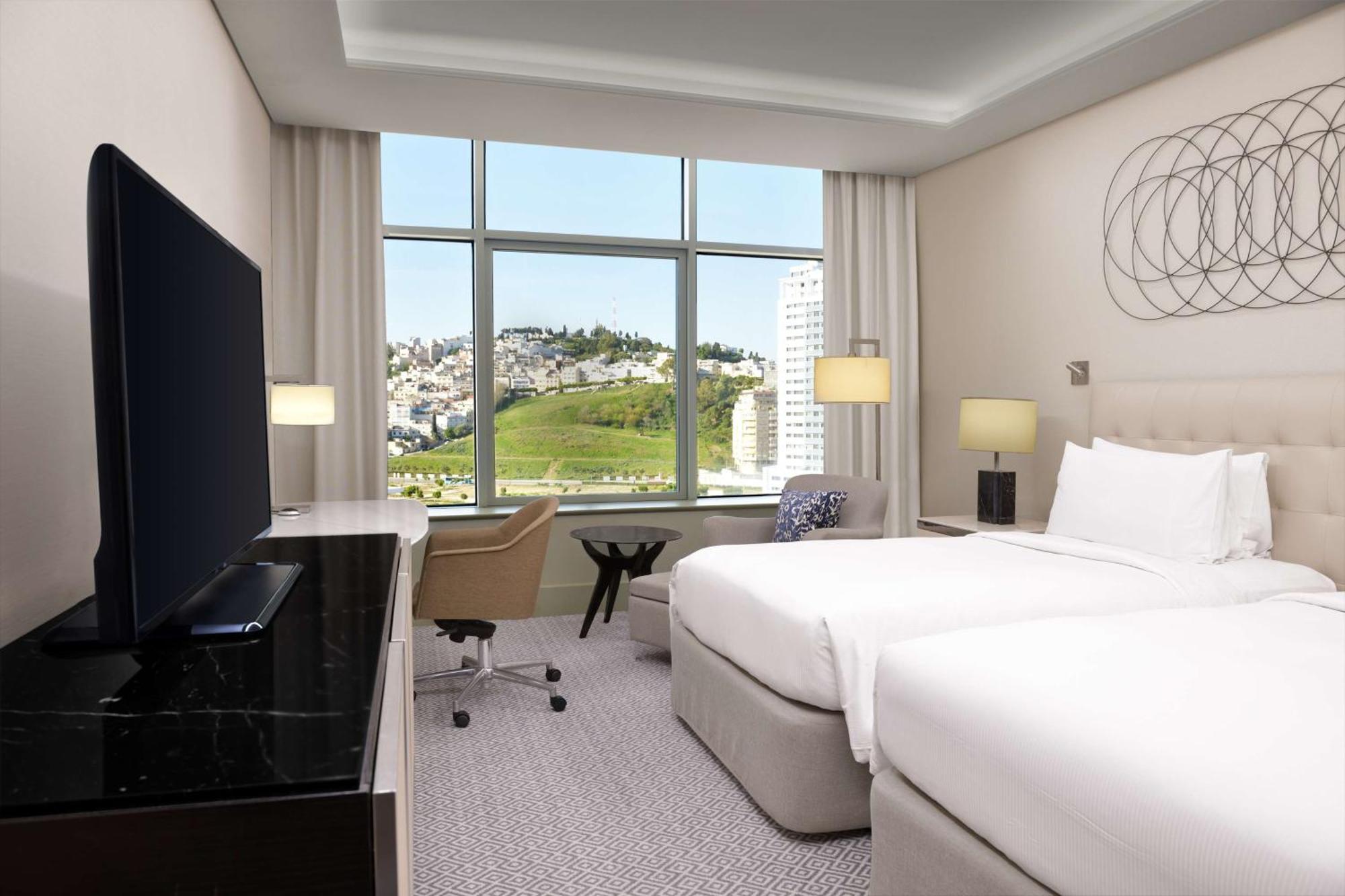 Hilton Tanger City Center Bagian luar foto A guest room at the hotel